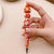 Eternal Bliss: Hand-Painted Beaded Pen