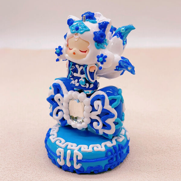 Blue and White Porcelain Nine-Tailed Fox Figurine