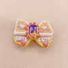 Radiant Ribbon: Individually Hand-Painted Squishy Zircon Bow Bead