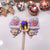Radiant Ribbon: Individually Hand-Painted Squishy Zircon Bow Bead