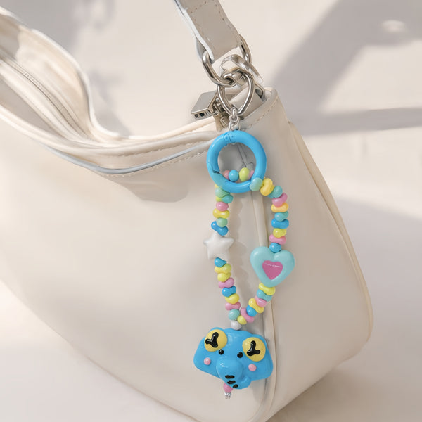 Ivory Glee — Hand-Painted Artisan Elephant-Silhouette Keyring & Bag Charm