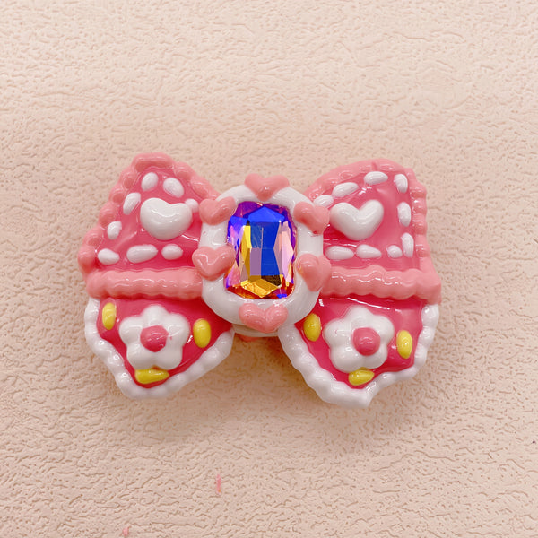 Radiant Ribbon: Individually Hand-Painted Squishy Zircon Bow Bead